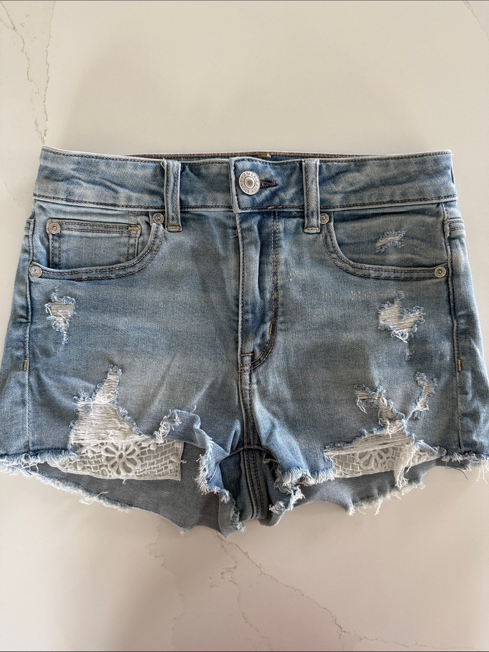 American Eagle Outfitters Light Blue Distressed Denim Shorts with Lace Panels